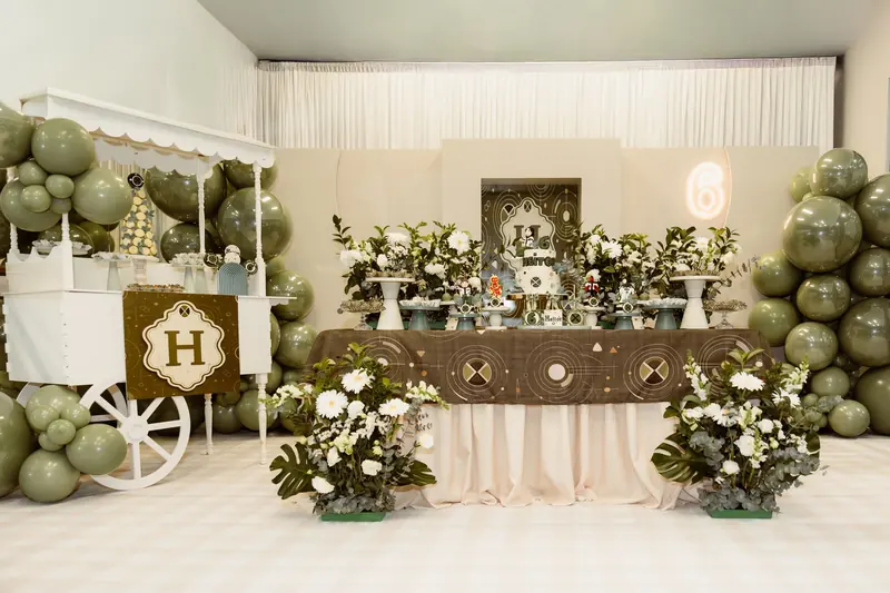 Ben 10: A sage and gold hero theme with a sweet cart, white florals and monogram details.